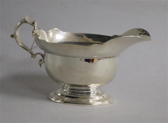 A George V heavy Britannia standard silver oval sauceboat, William Comyns & Sons Ltd, London, 1934, 11 oz.